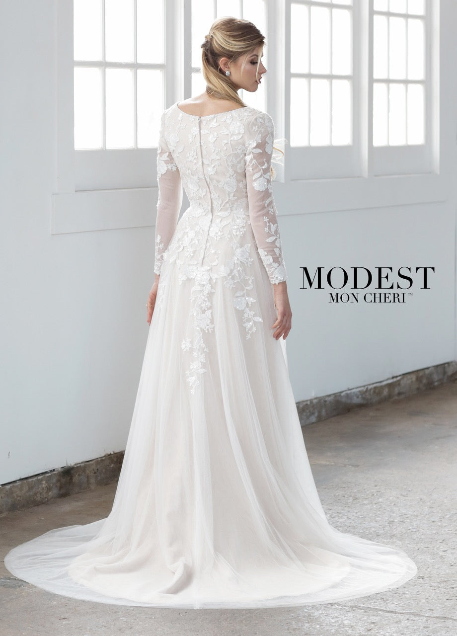 Mon Cheri TR21858 Modest Wedding Dress Back from A Closet Full of Dresses