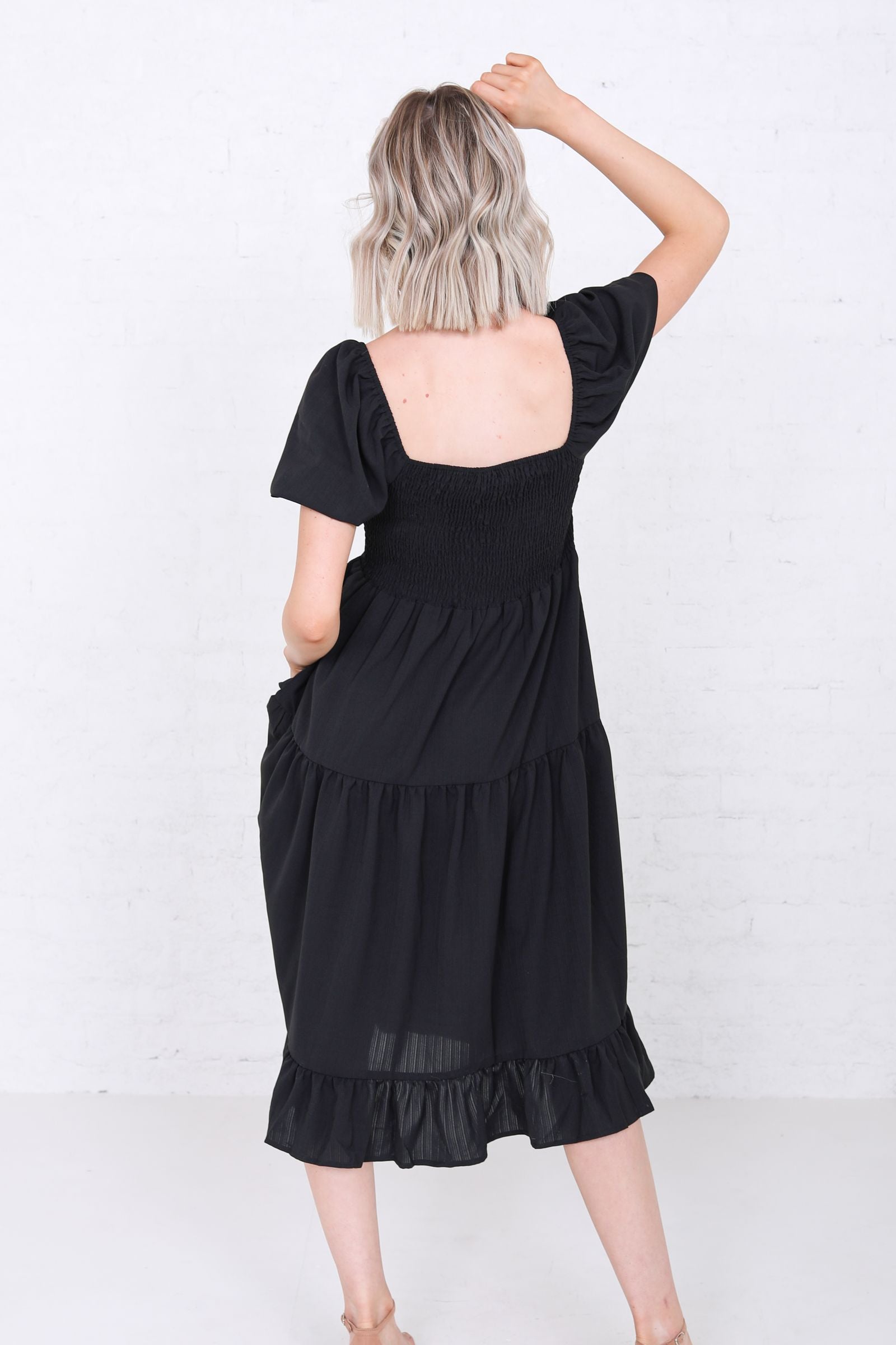 Poppy Modest Midi in Black